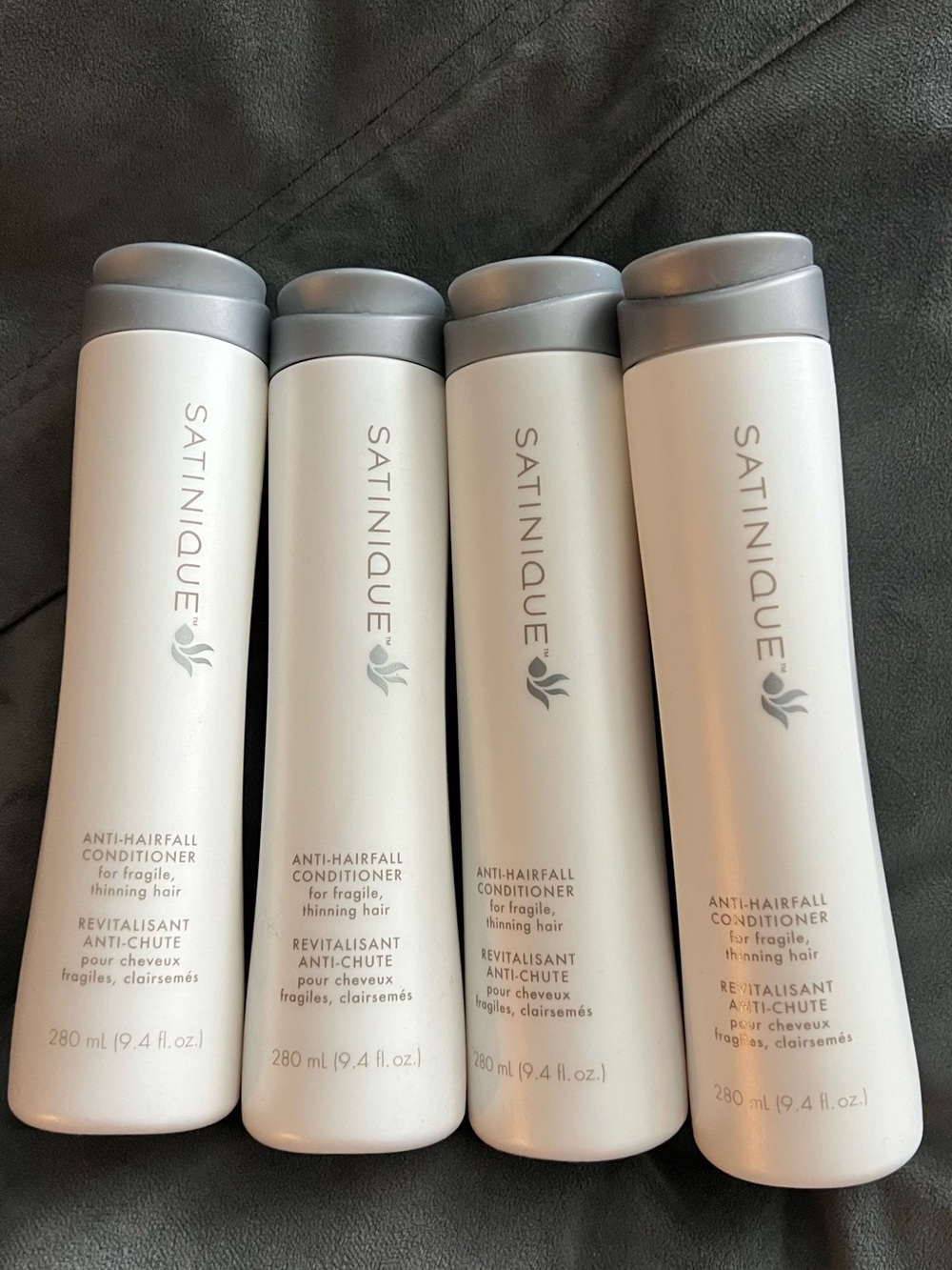 Four new never opened Amway brand conditioners for fragile, thinning hair